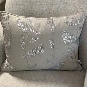 Sequined bird throw pillow